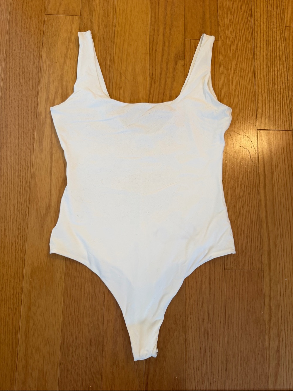 Sleek White Scoop Neck Bodysuit for Women